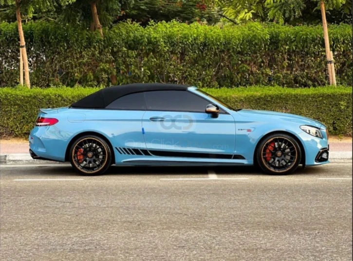 Mercedes Benz AMG C63 Convertible Brabus Kit 2021 BLUE RENTAL IN DUBAI - undefined
